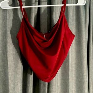 A cute crop top, size medium in women’s but fits like a small